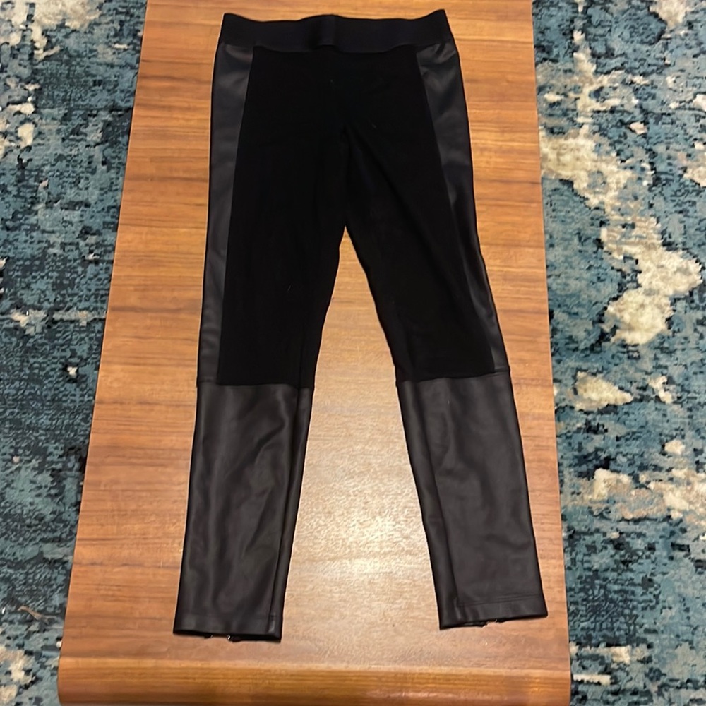 Express black leggings with faux leather details and zippers